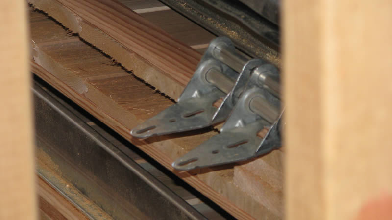 Double Hinges on Wood Garage Doors